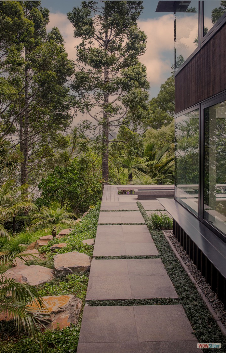 Stone paving, rock retaining and hardwood deck